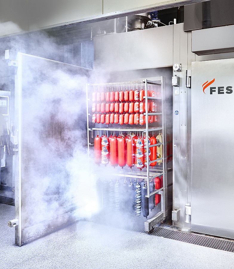 fessmann smokehouse being loaded with meat products