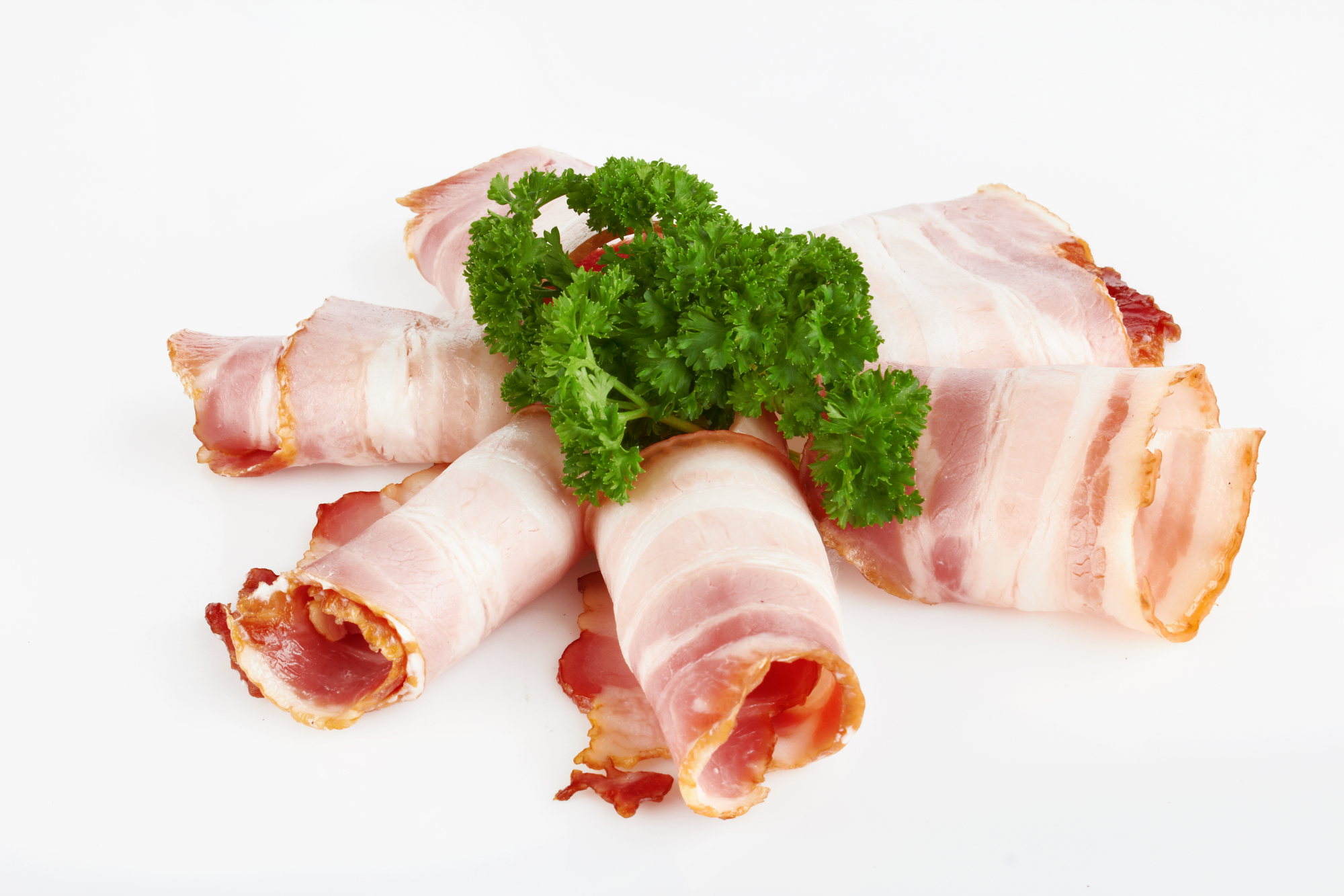sliced smoked bacon on white background